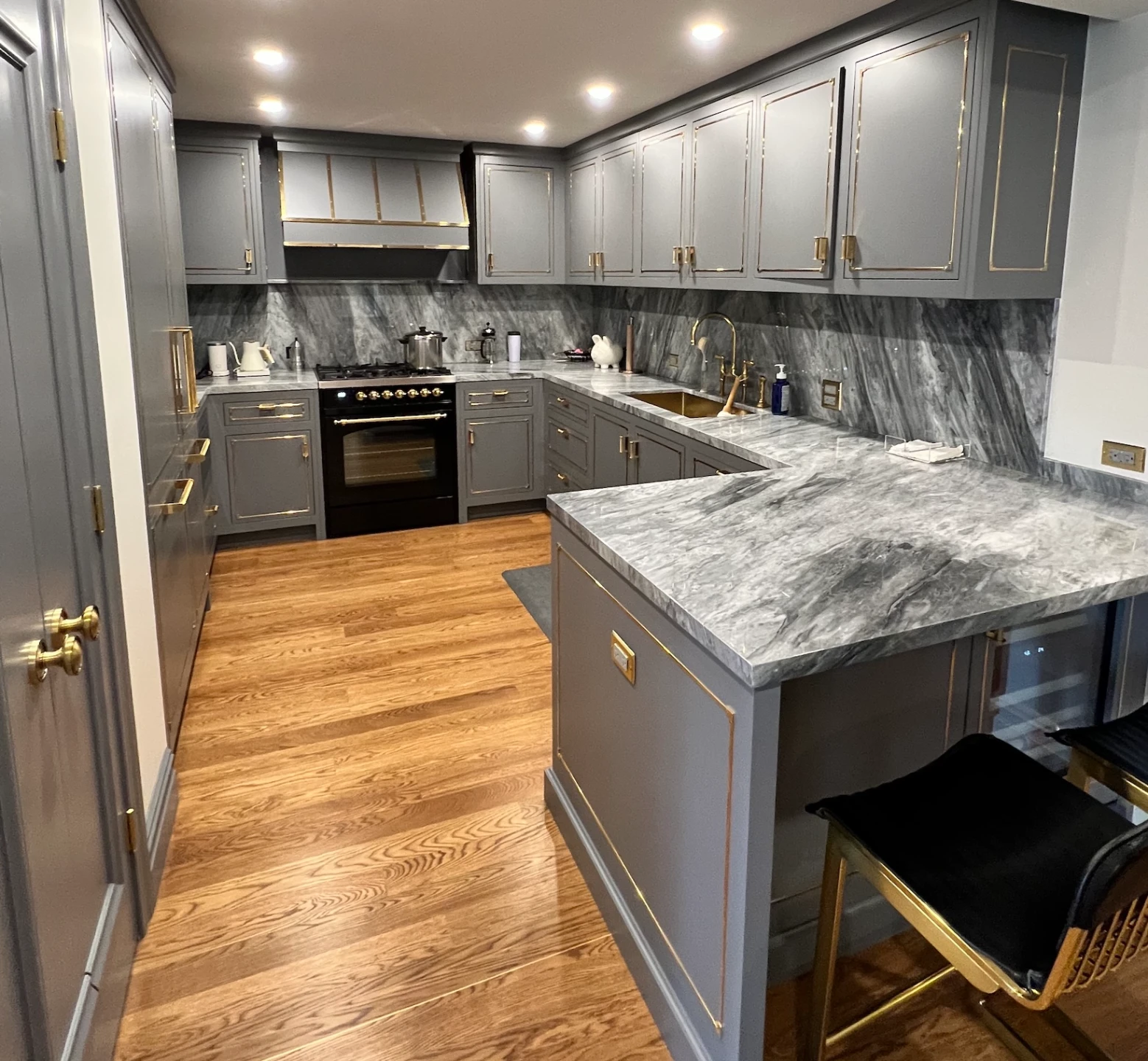 Professional NYC renovation craftsman installing custom millwork
